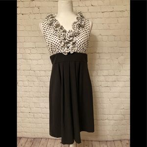 Juniors Size 9 Black & white dress - ruffled neckline - polka dotted pattern.
